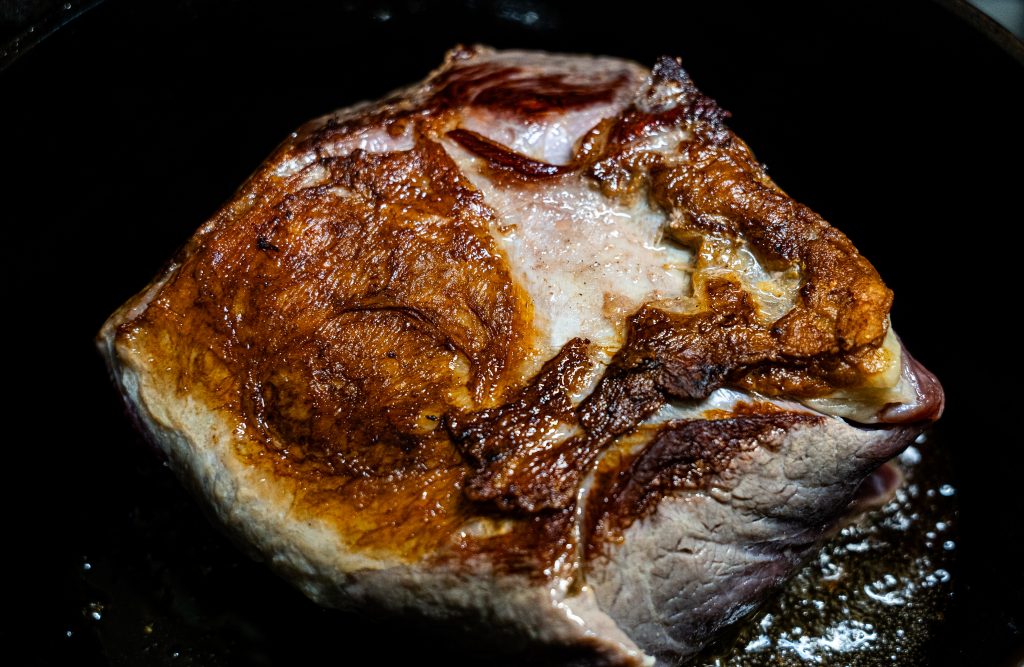 Beef shoulder roast after it has been seared