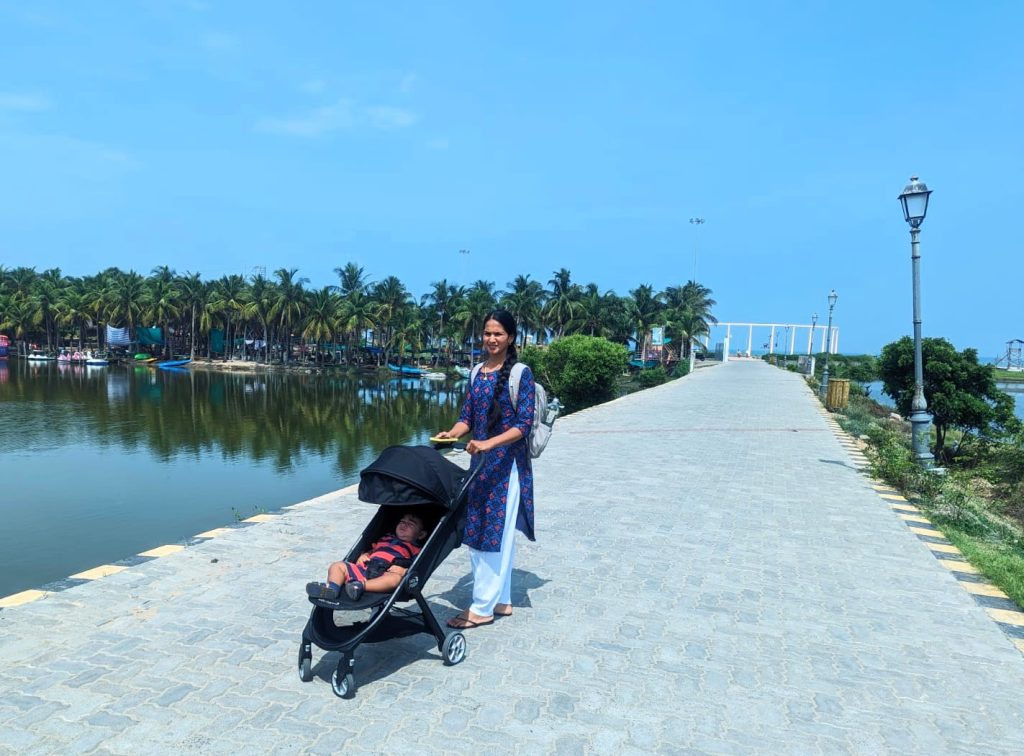 Mom walking 10,000 steps with baby on the beach