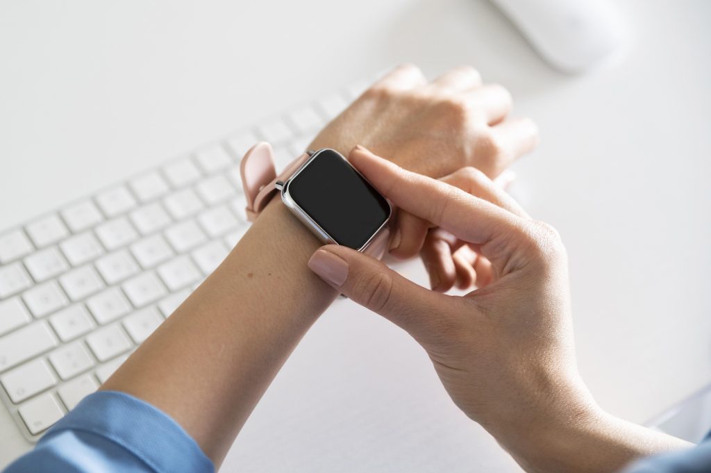 Woman wearing Apple watch to track her steps