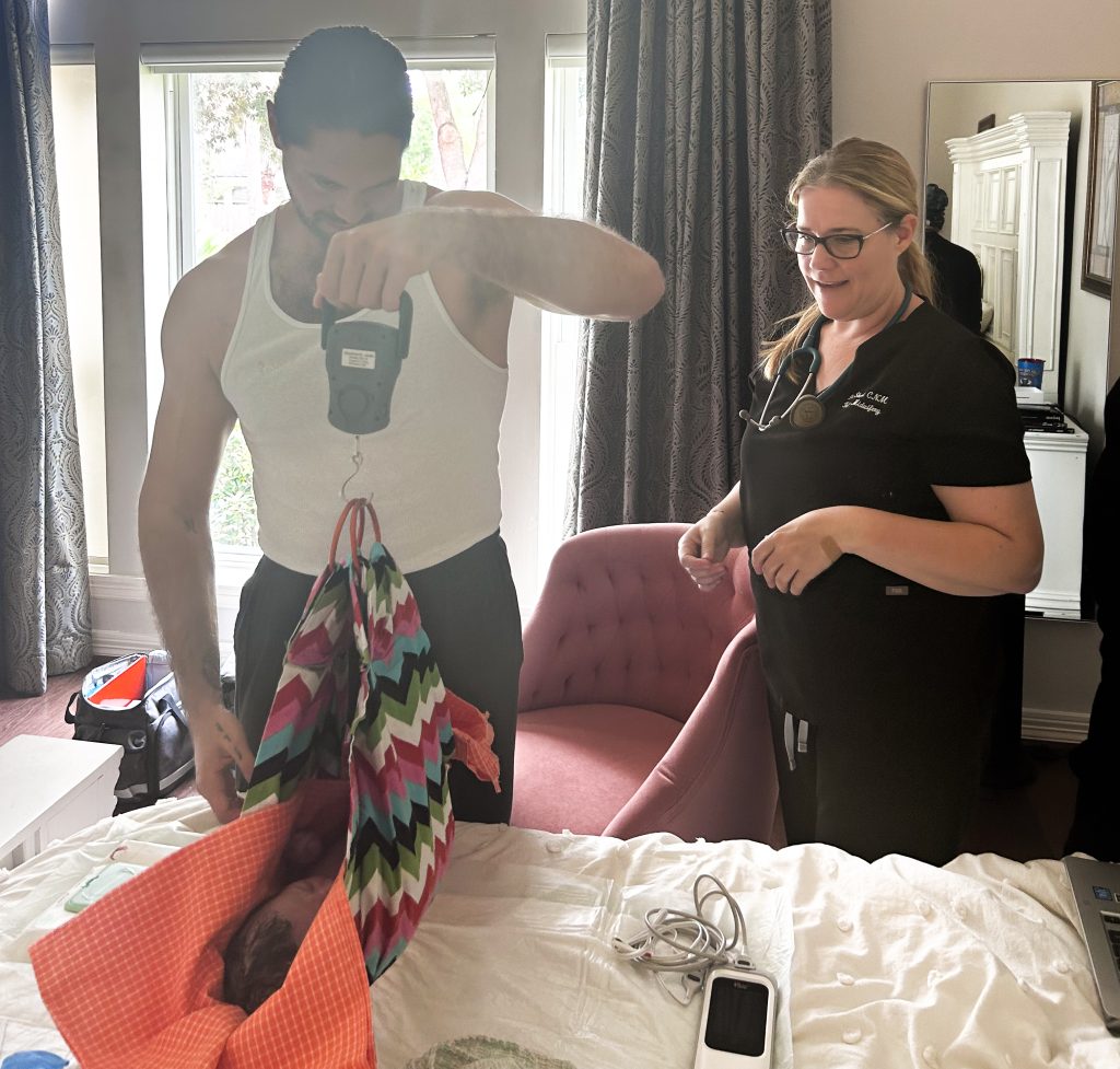 Newborn checkup at Preethi's home birth